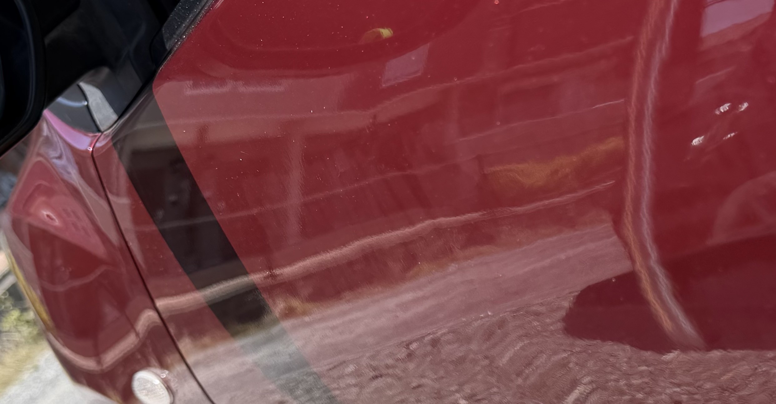 11箇所以上の凹みをデントリペアで修復した修理後の写真